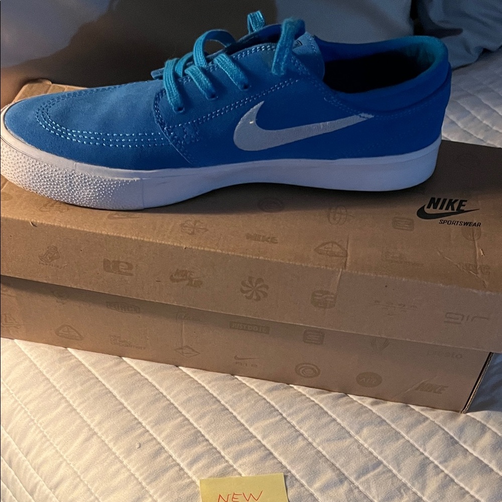 Nike Women’s Roral Blue Sneakers with White Accents